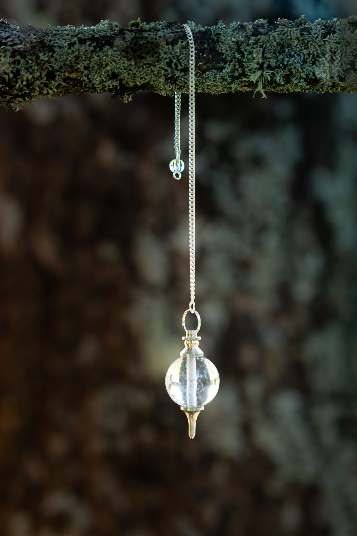 Péndulo Sephoroton de Cuarzo Transparente (Punta de Metal)