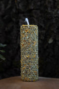 Vela artesanal Abre Caminos ritualizada con cera de miel de abeja y mezcla densa de hierbas sagradas