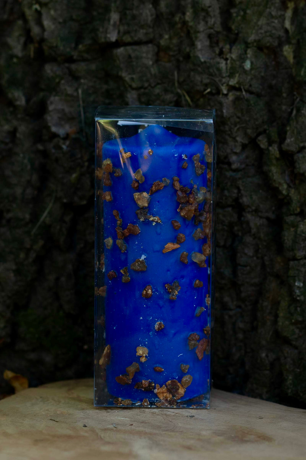 Velón azul decorado Estudios y Concentración de Las Velas de Mariano en embalaje transparente.